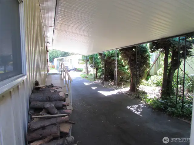 FULL LENGTH CARPORT OFF FRONT ENTRY