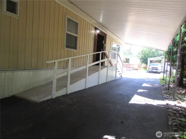 STURDY HANDI-CAP RAMP GOES TO FRONT DOOR