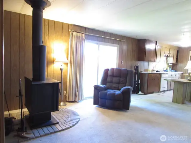 FAMILY ROOM HAS SGD TO NEWER COVERED PORCH.