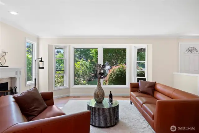 sun filled living room with bay window