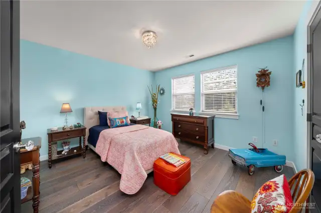 Each of the four bedrooms offers spacious walk-in closets, ensuring elegance extends to every corner of daily life. This is bedroom two.