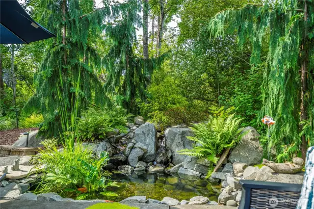 The gentle murmur of water creates a serene escape, perfect for unwinding or hosting under the stars.