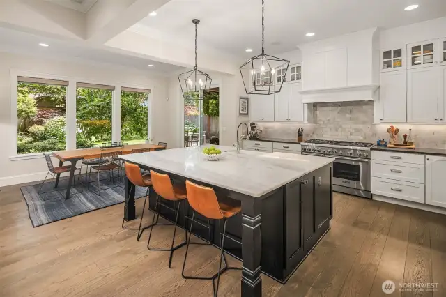 Designed to impress and built to perform—this dreamy chef’s kitchen features a massive marble-topped island, statement lighting, a serious range for serious cooking, and seamless flow to both the backyard and casual dining space. Bring your appetite—and your guest list.