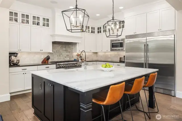 A kitchen designed with real life in mind—starting with the oversized fridge that’s ready for Costco hauls, lunchbox prep, and midnight snack runs. Form meets function in the heart of the home.
