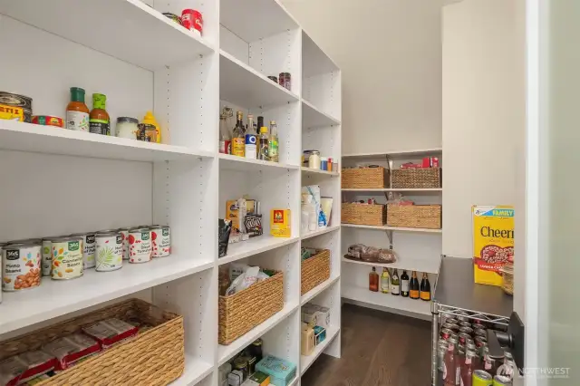 Where form meets function—and snacks meet storage. This walk-in pantry is ready for Costco runs, dinner party prep, and keeping everyone’s favorite cereal within arm’s reach.