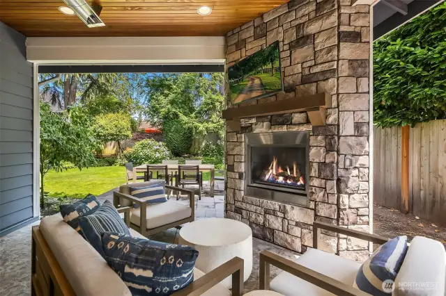 S'mores by firelight, game day on the outdoor TV, and dinner al fresco—this covered patio brings the vacation vibes home, rain or shine.