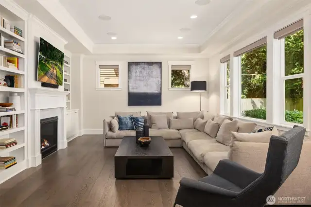 Where cozy meets classy—this light-filled great room invites lazy Sundays, movie marathons, and impromptu book club nights (even if it's just you and the dog).