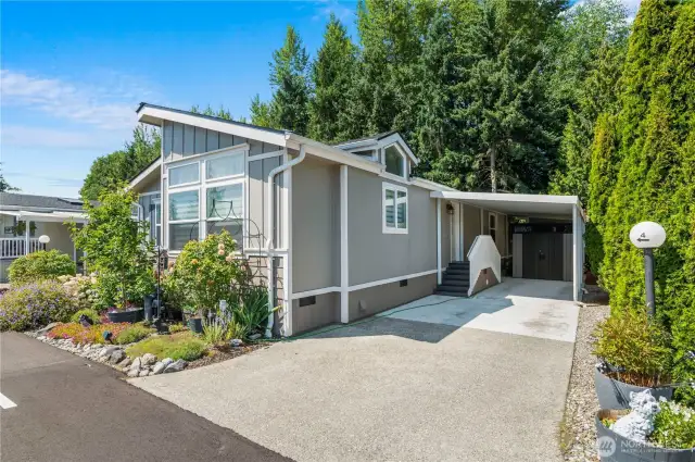 Driveway with covered parking.