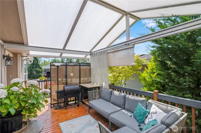 Beautiful light filled covered front deck. You will feel like you are in your own private oasis.