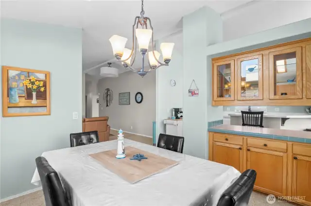 Dining room features convenient serving counter and built ins.