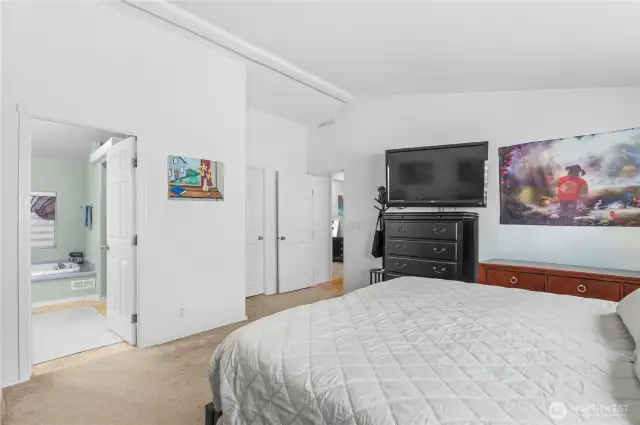 Attached primary suite bathroom.