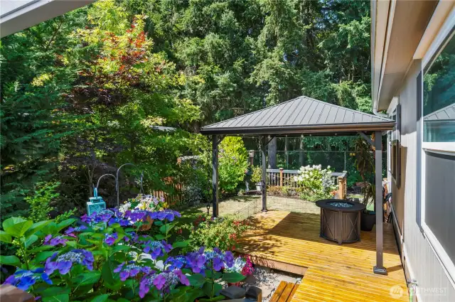 Multi tiered deck to enjoy this beautiful yard!