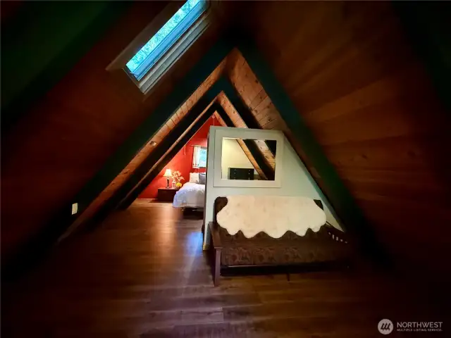Upstairs loft bedroom w/ bonus area.
