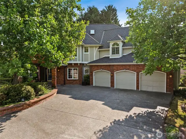 Generous three car, 850 sq ft garage.