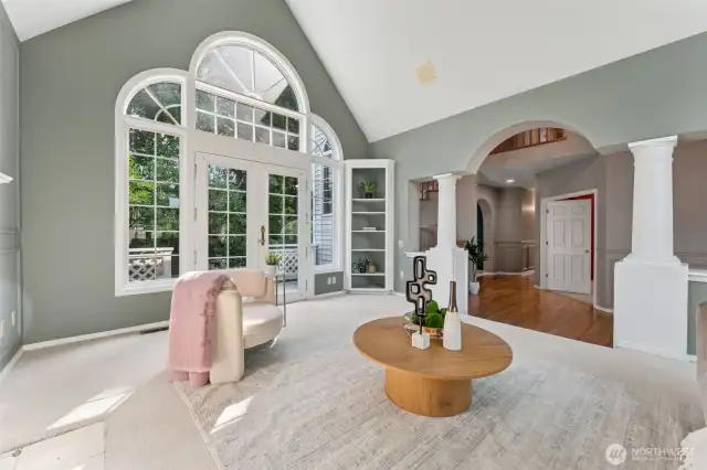 From formal living room, looking out to deck and private backyard.