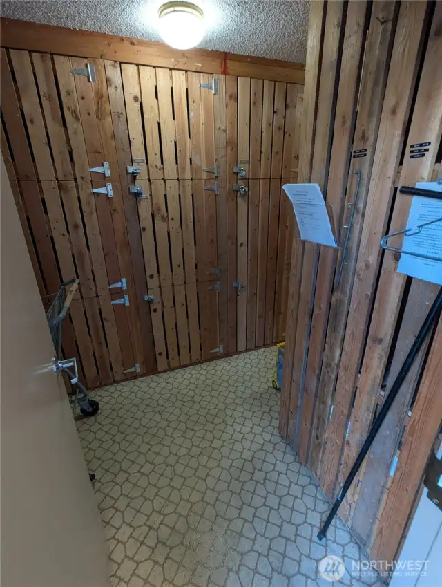 Storage unit off of main building entry