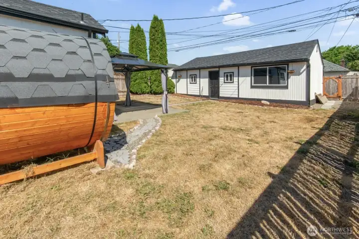 Look at the detached 3 car garage with separate heated office space.