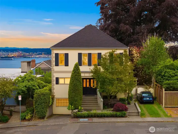 Boutique Building divided into 2 Units with shared backyard, gardens and patio