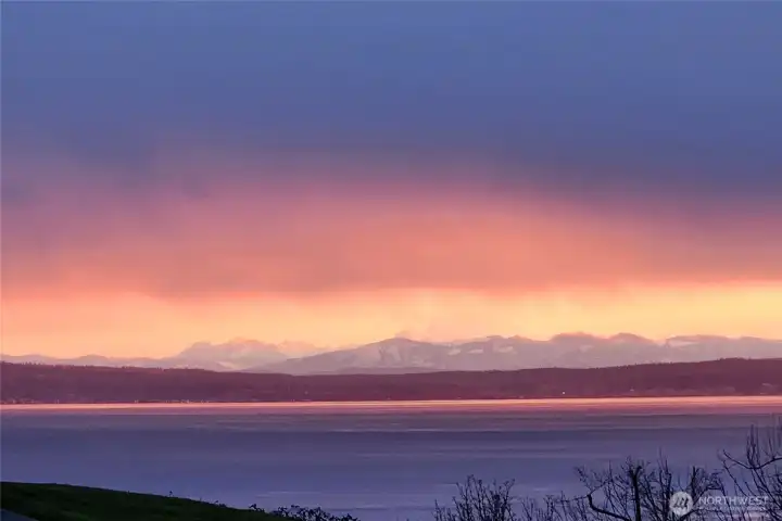 Ever changing Puget Sound and Cascade Mountain views delight from almost every window.