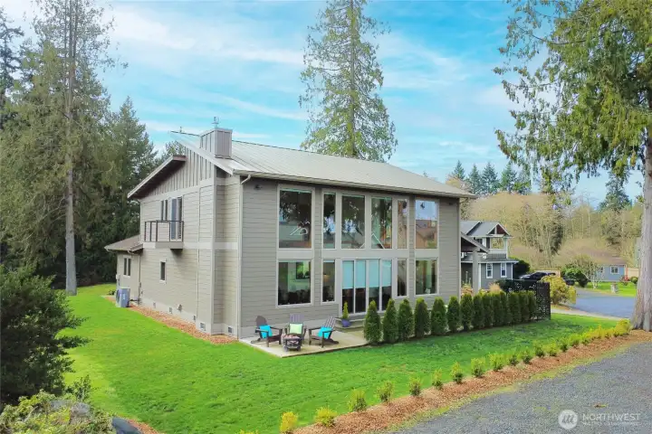Another view of the north side with its wall of windows with power blinds for privacy.
