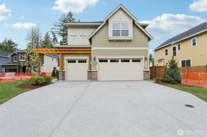 3 car garage with long driveway. Fenced rearyard and covered deck.