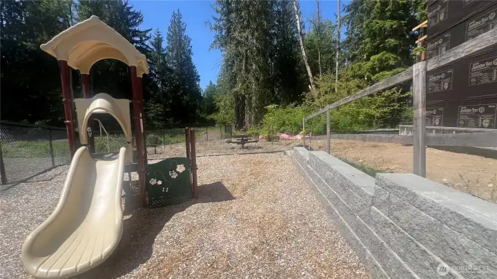 Community tot lot and picnic tables