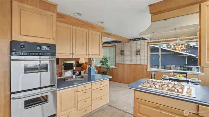Additional living space off of the kitchen with a super cool retro indoor BBQ.