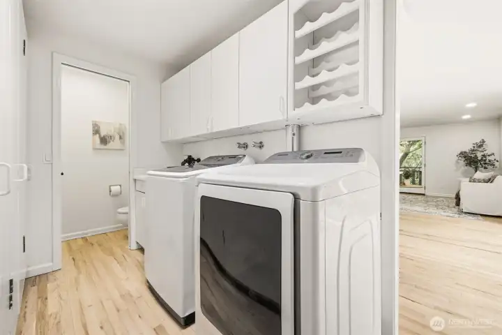 utility room with a water closet