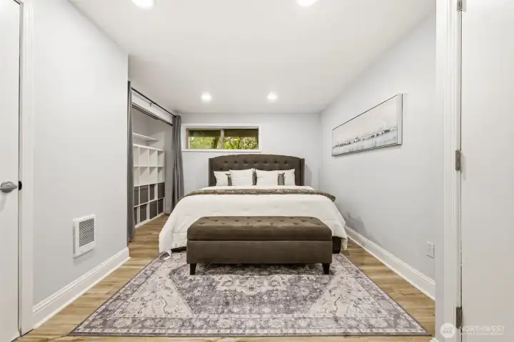 Lower room used as a bedroom with an ensuite
