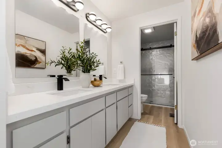 Fully remodeled bath with dual sinks, mirrors, lighting, accents