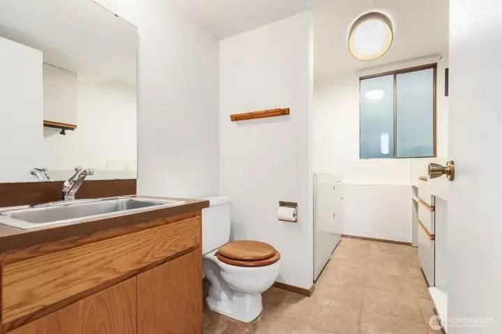 1/2 bath, washer and dryer, additional storage