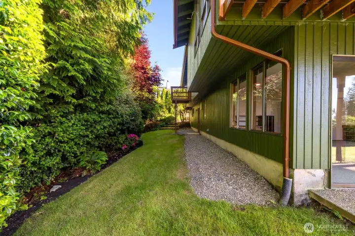 Private backyard space nestled into the trees