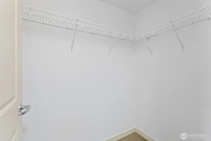 Large walk-in closet Large walk-in closet