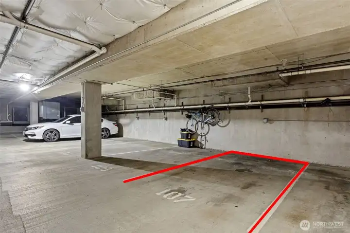 1 parking space with EV charger located in secure garage 1 parking space with EV charger located in secure garage