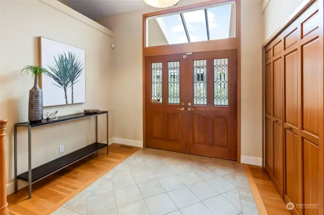 Beautiful hardwood flooring and lovely ceamic tile entry floor