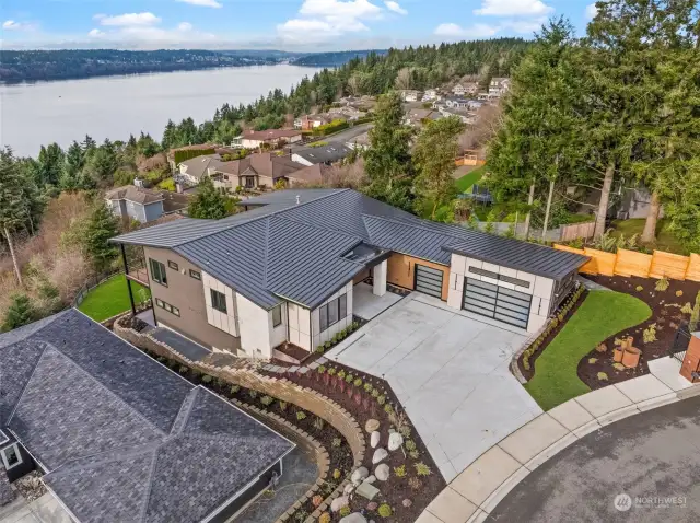 This modern beauty is perched atop Narrows Ridge, surrounded by beautiful landscaping and offering panoramic views from Steilacoom to Gig Harbor. Welcome home!