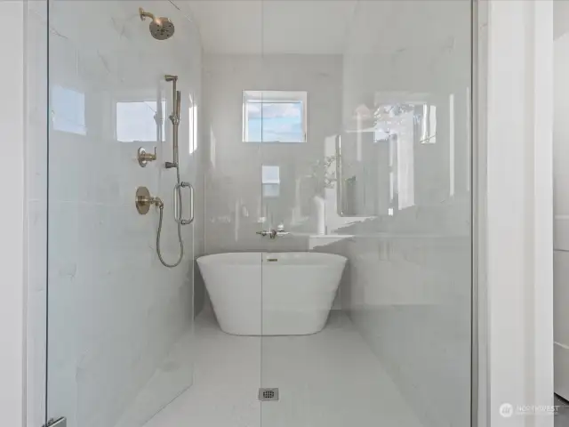 Luxurious primary bath with walk-in shower and soaking tub!