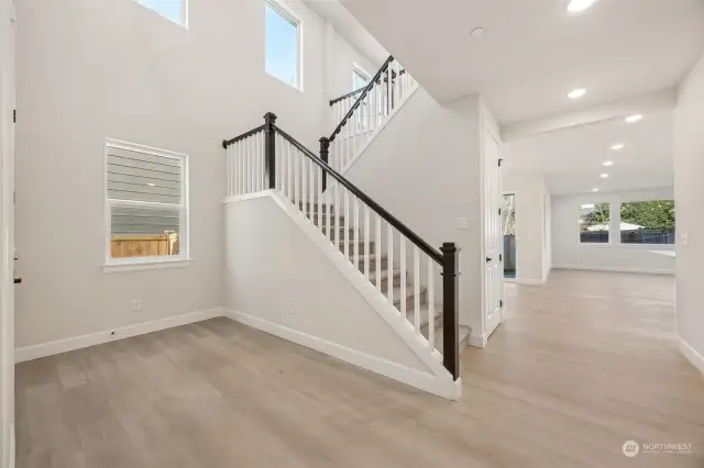 Entry showing Open Stair Rails and lots of Light