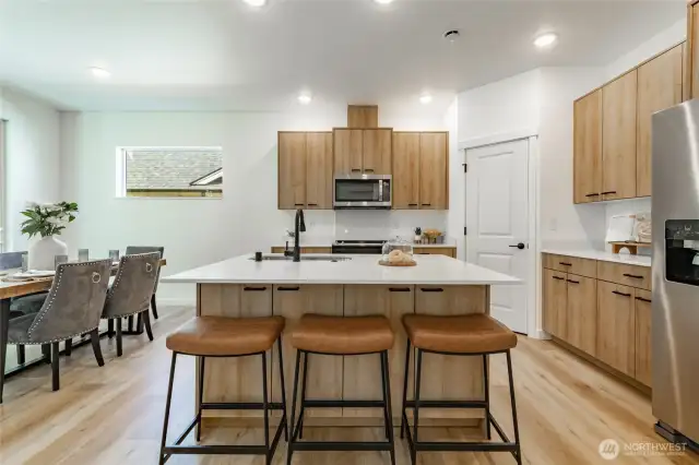 Photos shown are of a similar floor plan previously built in a different neighborhood (The Ridge in Blaine). Finishes and features may vary. Some items pictured reflect buyer-selected upgrades which are not included in the base price and may be added at an additional cost.