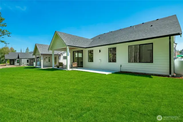 Photos shown are of a similar floor plan previously built in a different neighborhood (The Ridge in Blaine). Finishes and features may vary. Some items pictured reflect buyer-selected upgrades which are not included in the base price and may be added at an additional cost.