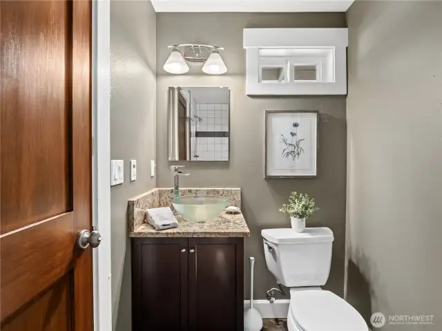 The 3/4 bathroom adjoins the 2nd bedroom with additional access for guests.
