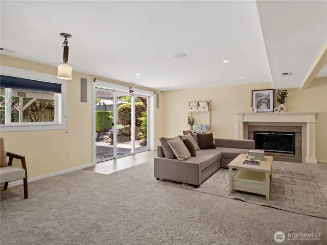 Featuring a cozy fireplace as a focal point.