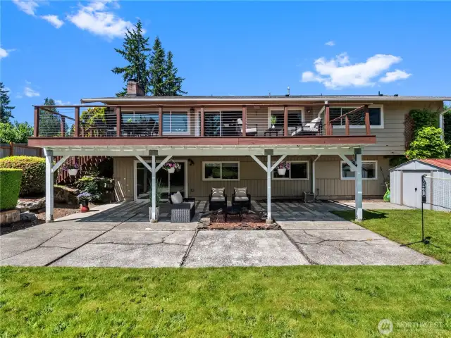 The property also features a large, well-maintained lawn, perfect for recreation.