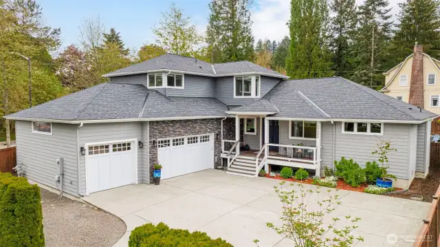 This 3+ car garage is built for unmatched convenience, with 12-foot ceilings perfect for a car lift, a 26-foot-deep layout, finished walls and trim, and abundant built-in storage. Additional features include:    Extra LED lighting and multiple surrounding power outlets  A large storage room (6.5’ x 8.5’, 12’ ceiling) with shelving  Hot and cold water spigots in the front for car washing and in the backyard for added convenience  Backyard access via a separate door, with gated side access