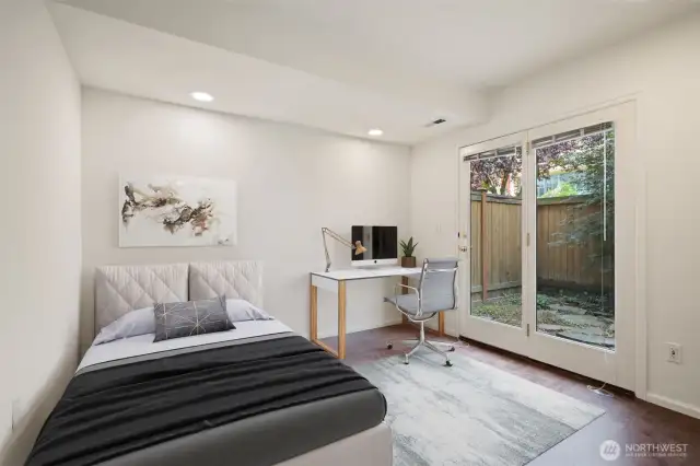 First floor bedroom or office with slider to private fenced patio