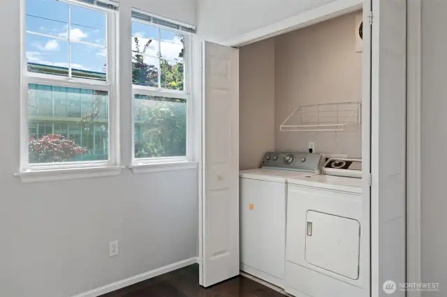Easy access washer dryer on main level of kitchen
