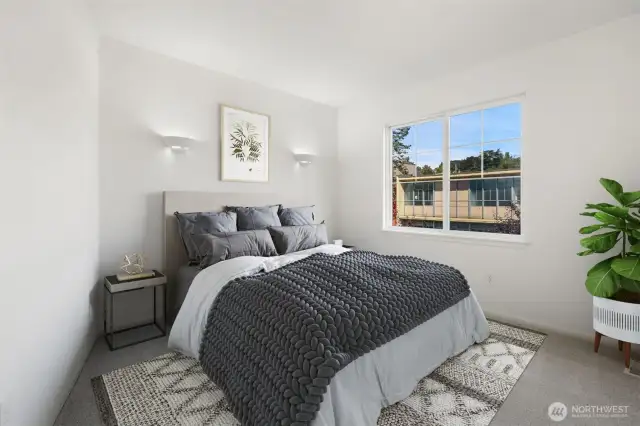 Upper level bedroom with views toward elementary school - fresh paint and carpets - Virtually staged to show possibilities!