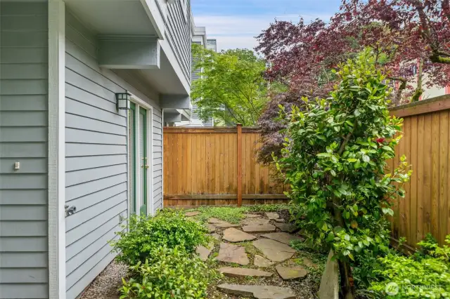 Private fenced patio space off entry and also bedroom or office