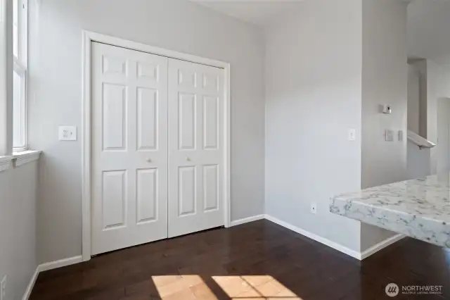 First level bedroom or office with wood floors, french doors to patio and garden