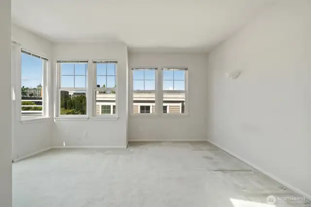 Primary bedroom without virtual staging - nice outlooks onto a great city